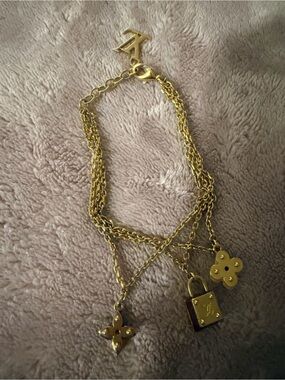 Louis Vuitton Multi-Chain Charm Bracelet with Lock and Flower Pendants
